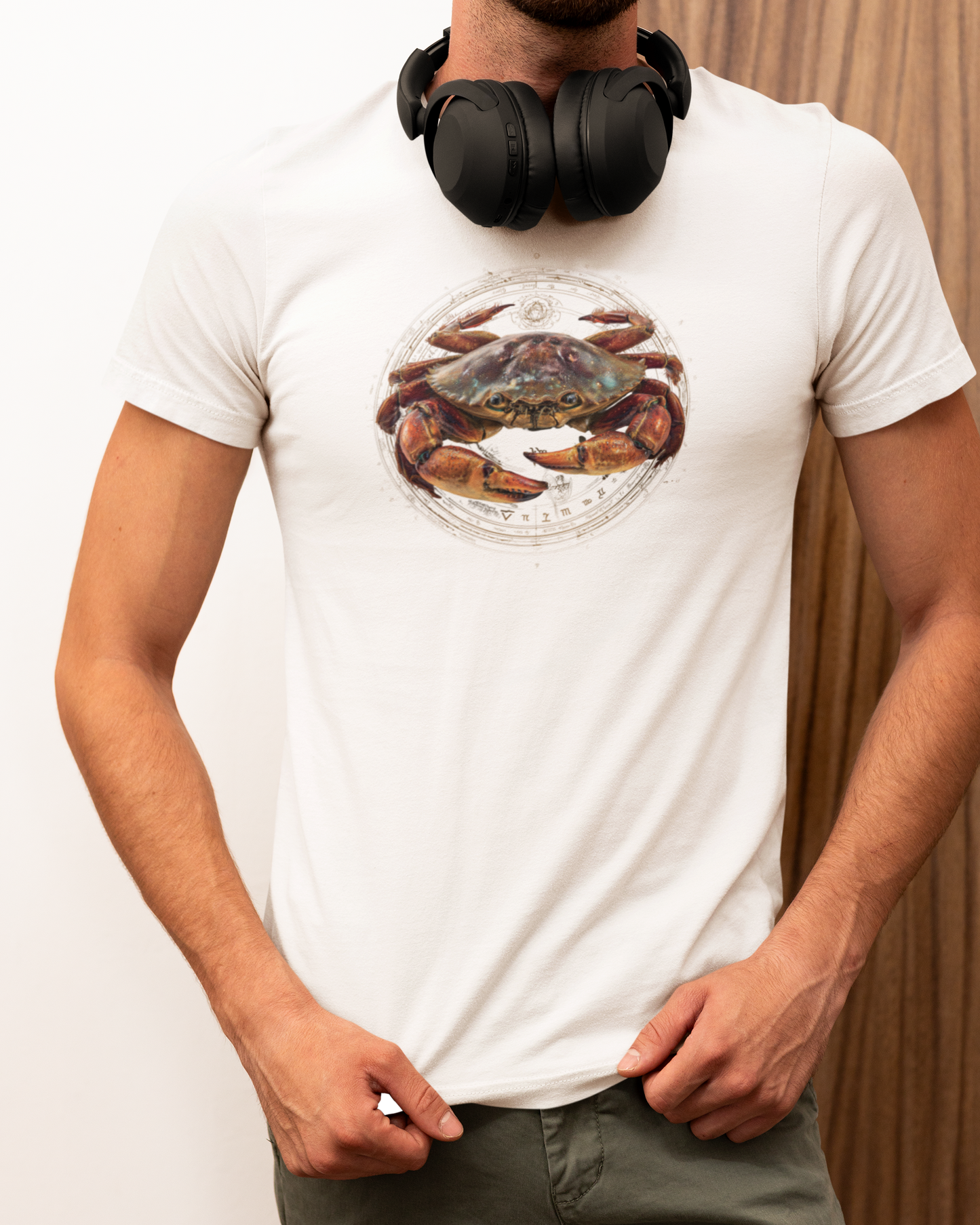 Cancer man wearing a white t-shirt with a fish zodiac sign