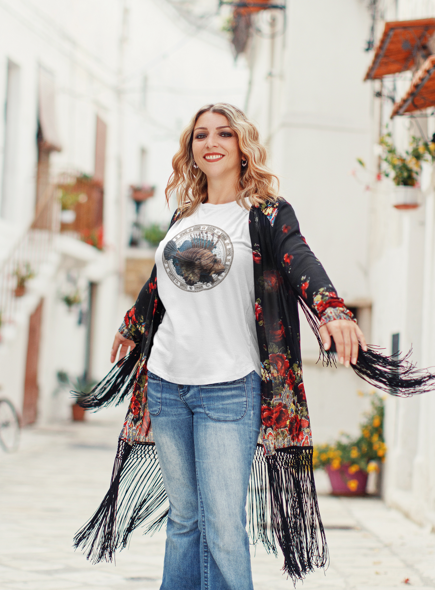 Leo woman wearing a white t-shirt with a fish zodiac sign
