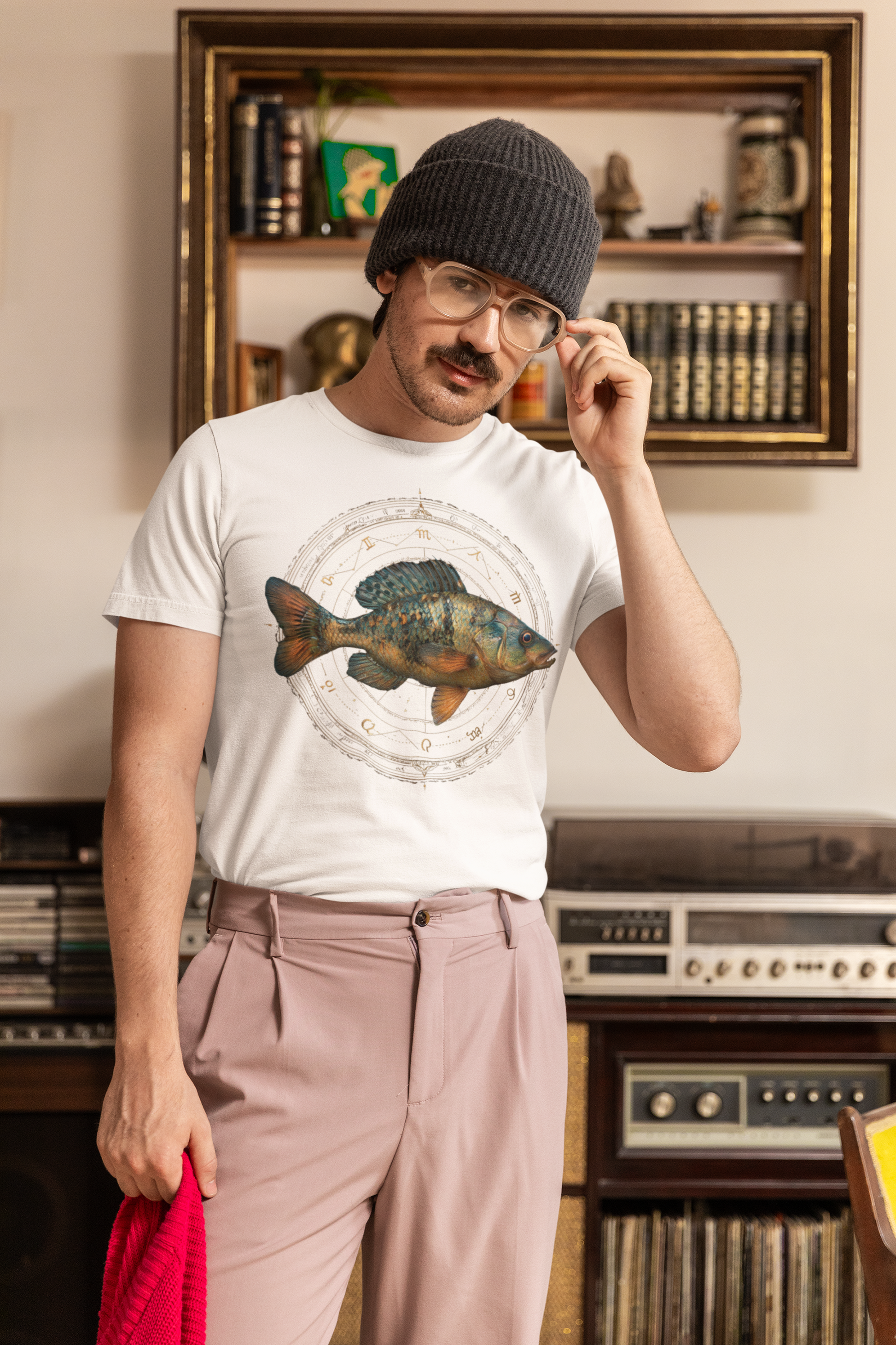 Sagittarius man wearing a white t-shirt with a fish zodiac sign