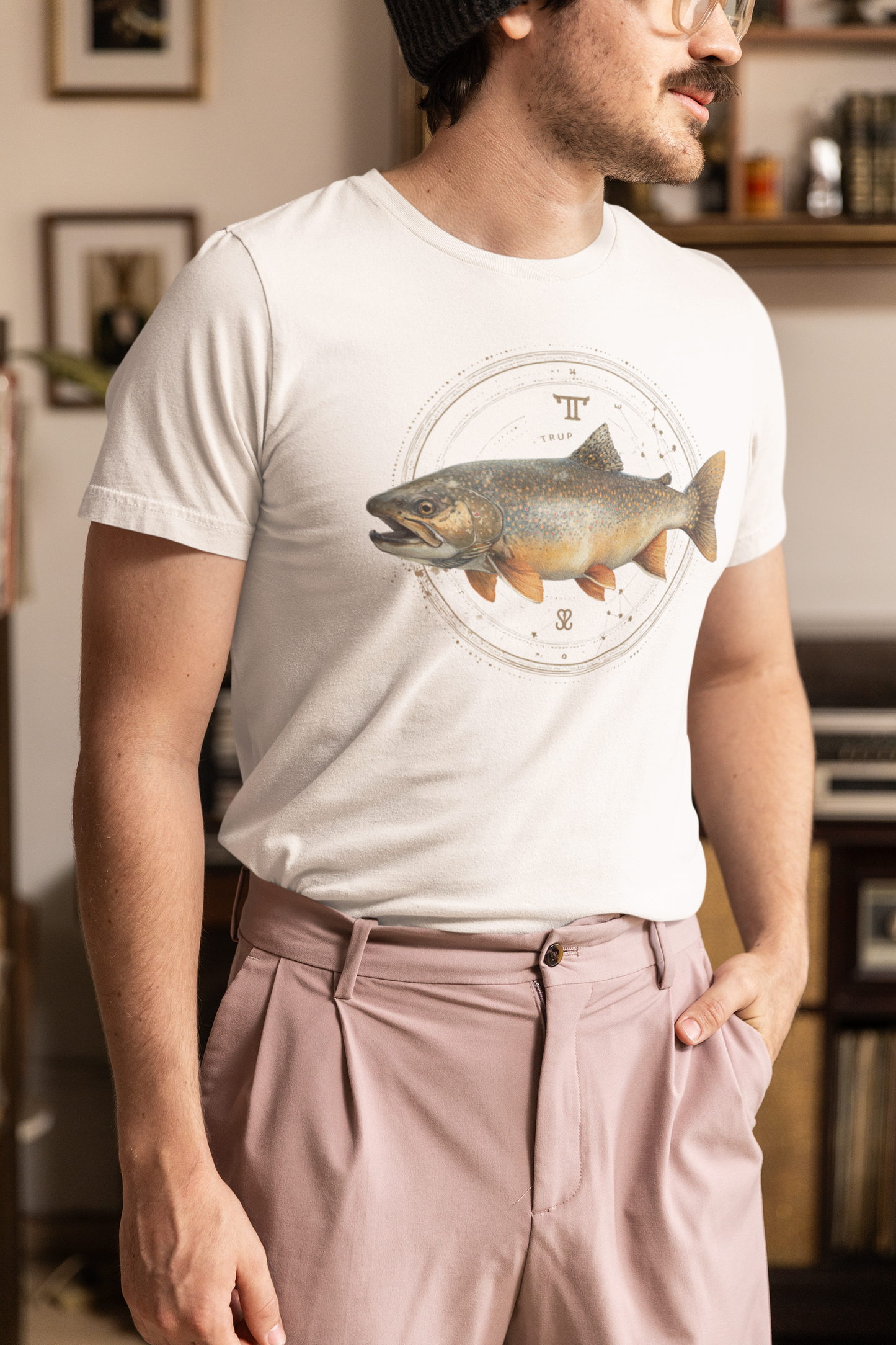 Taurus man wearing a white t-shirt with a fish zodiac sign